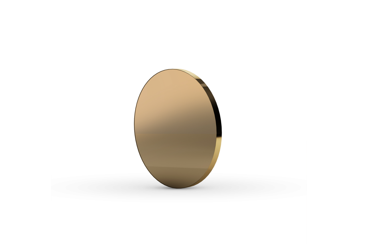 Round mirror with steel frame whose gilt finish renders it as precious as a luxury fashion jewel; created to impart strong character to any context through its magical presence.